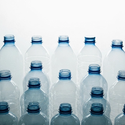 Assortment of neatly categorized plastic bottles ready for recycling